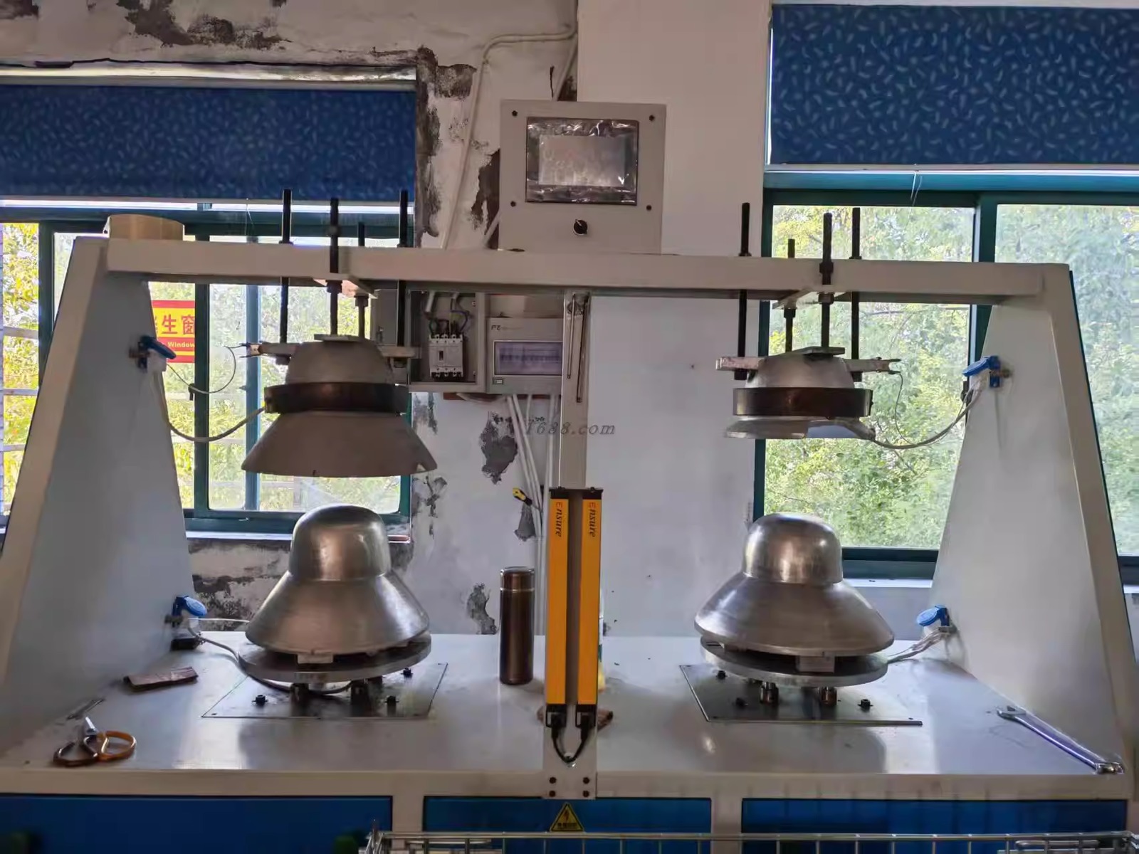 Hat pressing machine in the production facility