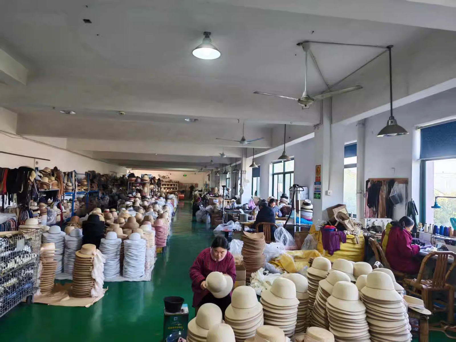 Hat workshop with straw hat production in progress